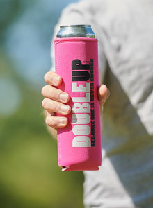 Hand holding a pink color double can cooler