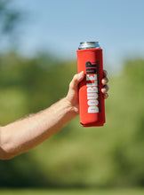 Load image into Gallery viewer, Hand holding a red color double can cooler
